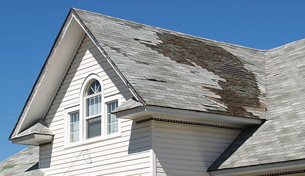 Damaged roof in need of repair. Call First General Services!