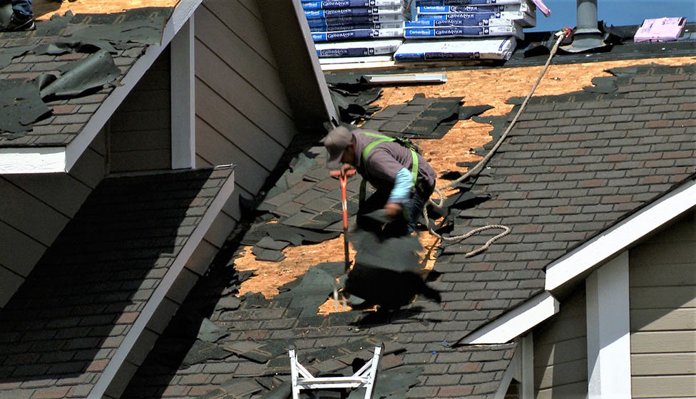 Roof repair and replacement by First General Services.