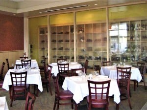 FGS Commercial Build-Out of Sirenuse restaurant in Denver, Colorado - dining area and wine cabinet after